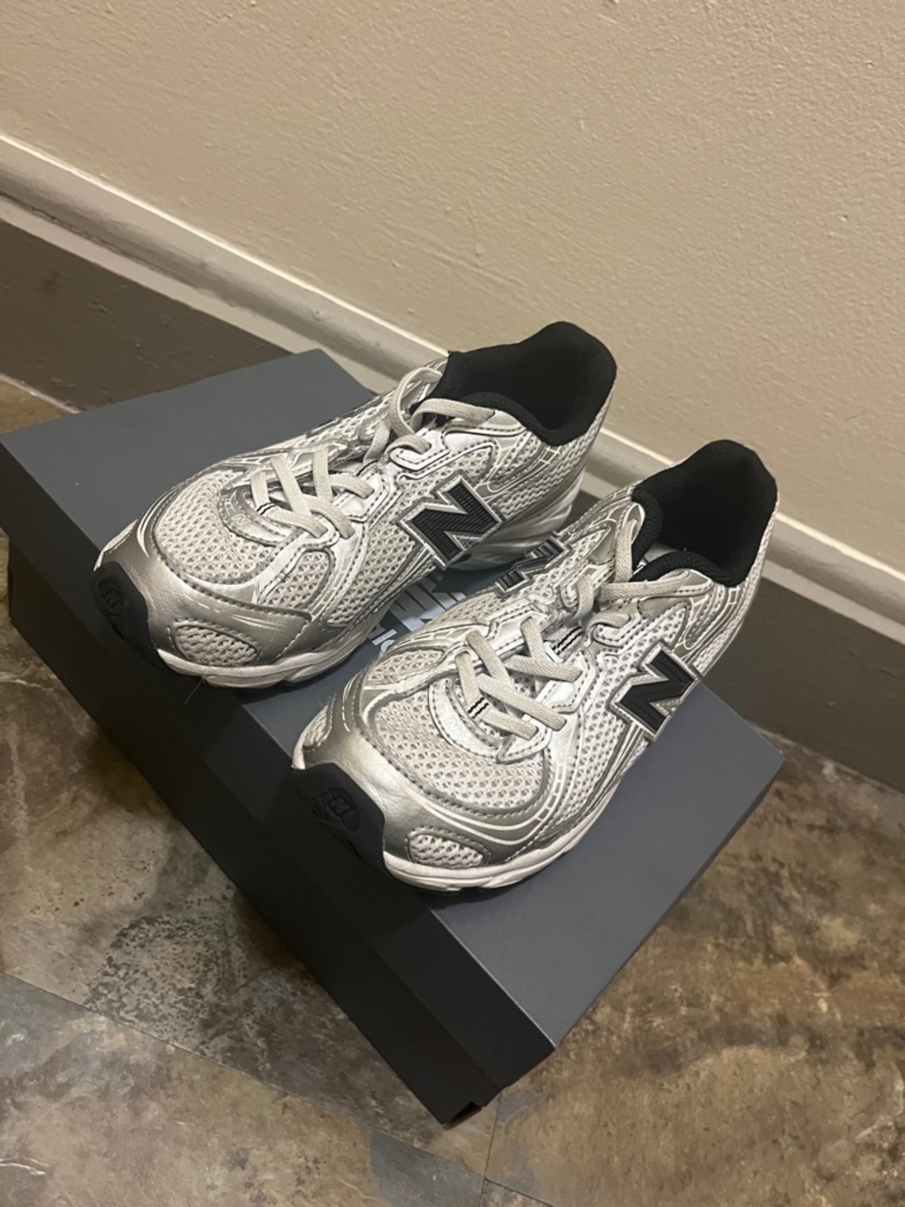 New Balance Silver and Black Mesh Running Sneakers